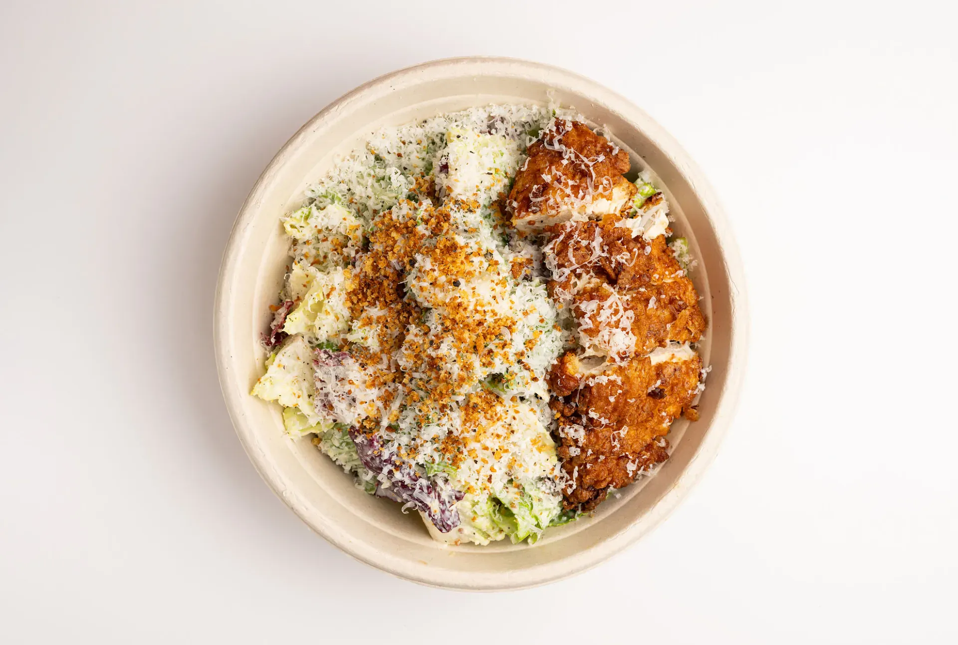 Chicken Caesar Salad - romaine lettuce, radicchio, softies caesar dressing, spicy panko breadcrumbs, parmigiano reggiano
